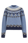 the alanui sweet winter sweater reinterprets traditional knitwear through meti