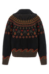 the alanui sweet winter cardigan is distinguished by a complex jacquard workma