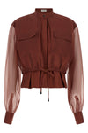 the brunello cucinelli blouse exemplifies the brands mastery in material contra