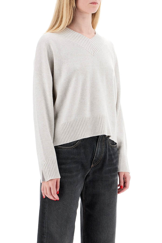 cashmere pullover with shiny cuff details.