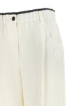 brunello cucinelli trousers redefine the codes of everyday elegance through a re