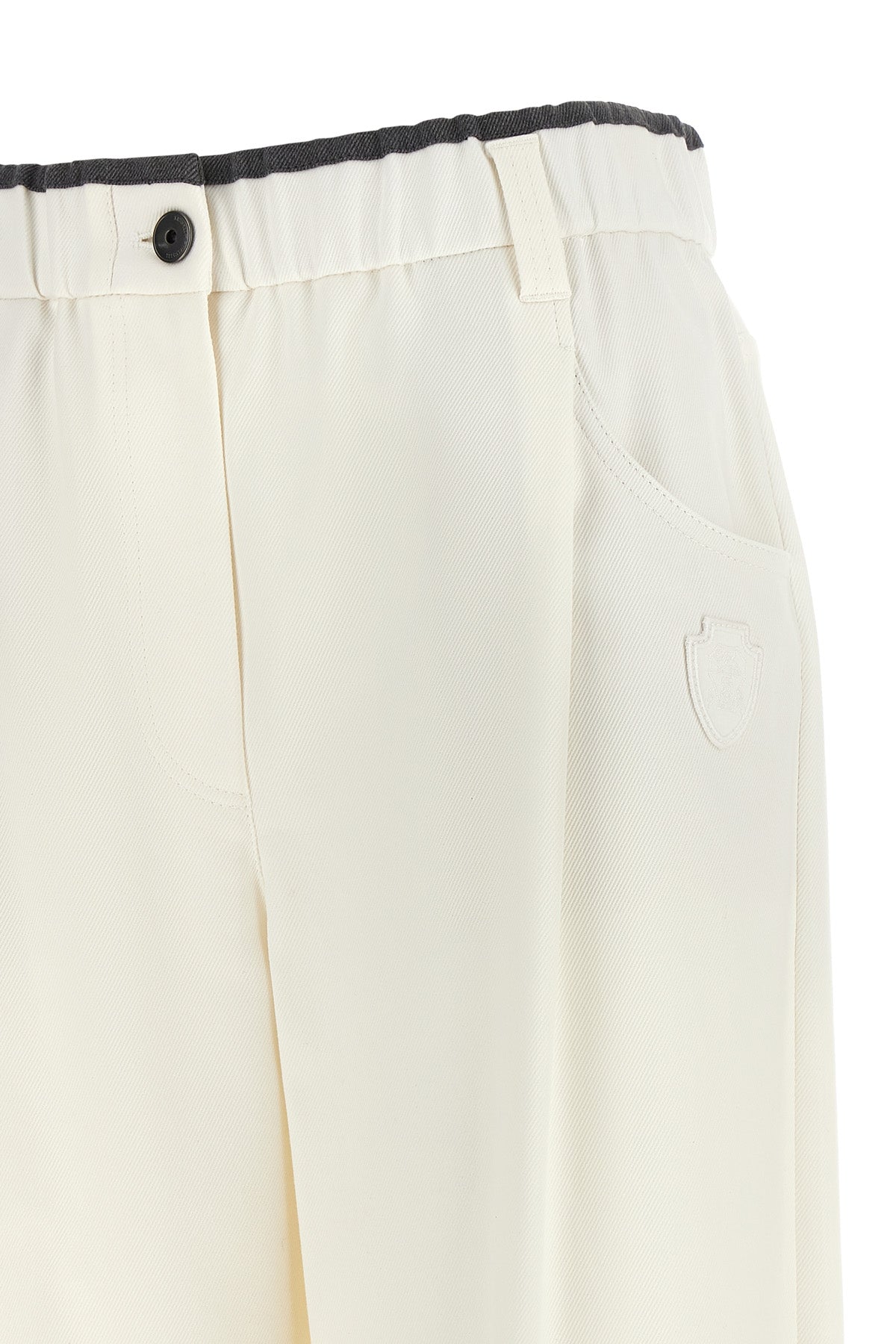 brunello cucinelli trousers redefine the codes of everyday elegance through a re