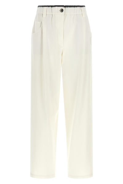 brunello cucinelli trousers redefine the codes of everyday elegance through a re