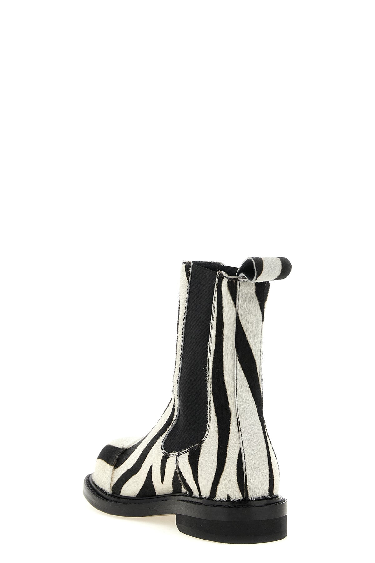 moschinos chelsea ankle boots redefine urban aesthetics through world-class man
