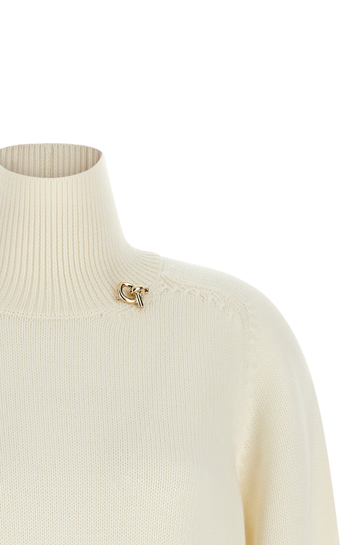 the fabiana filippi sweater sets a new standard in knitwear through a relaxed si