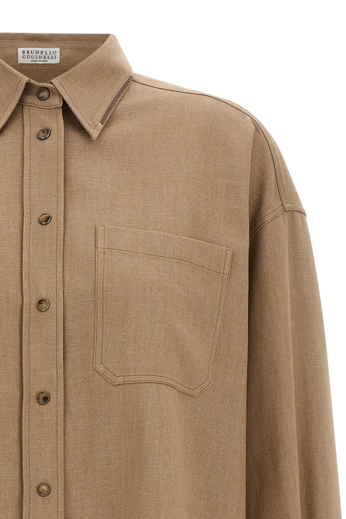 the brunello cucinelli shirt stands out for its relaxed silhouette