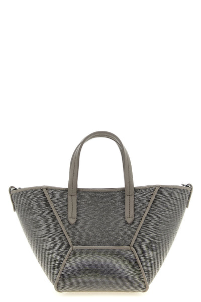 the brunello cucinelli handbag defines a sophisticated aesthetic through a rigor