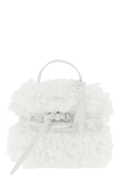 moschinos tie me small handbag stands out for its soft and unstructured silho