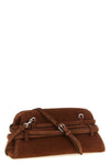 the moschino large tie me cutch in soft tobacco-colored suede stands out for i