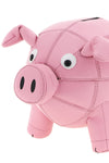 the moschino piggy bank clutch bag redefines the concept of accessory through