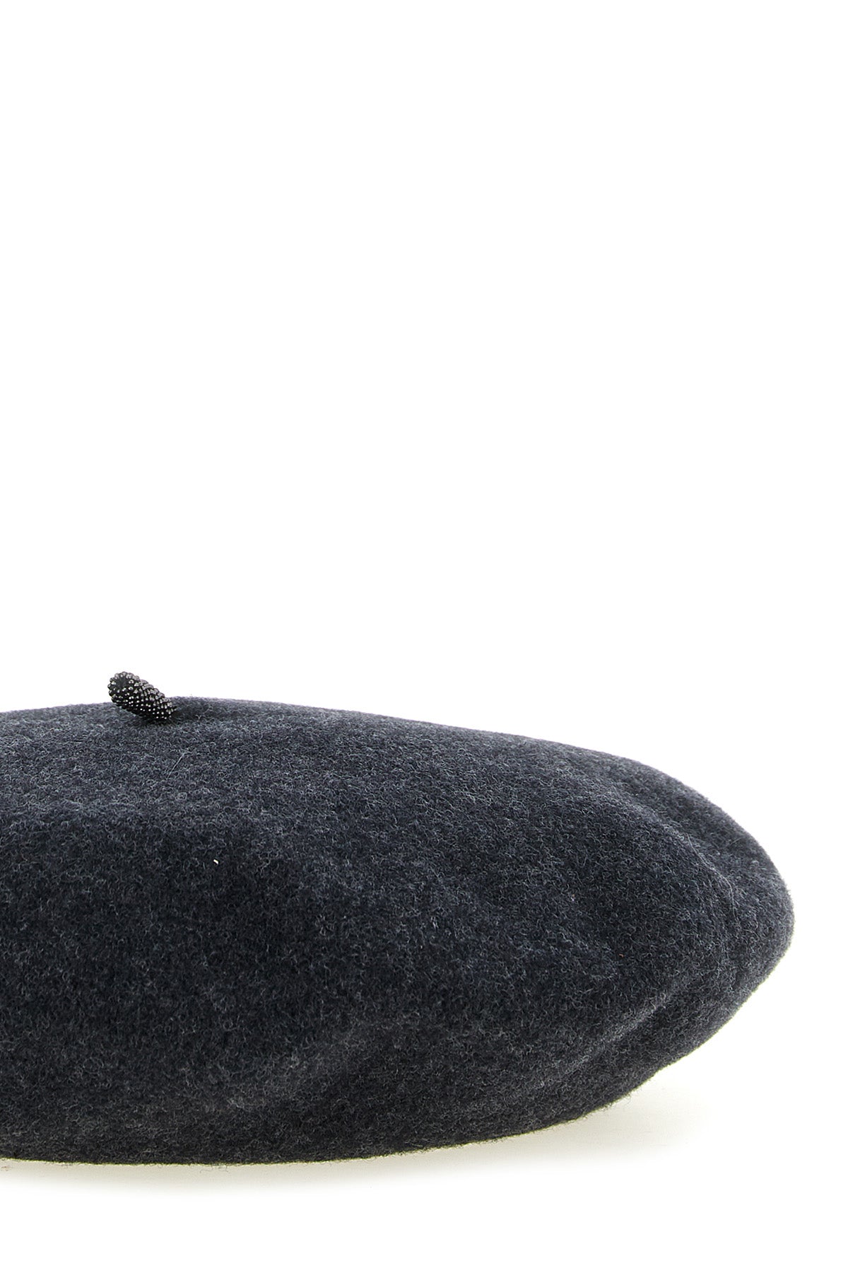 brunello cucinellis basque style cap reinterprets a wardrobe classic