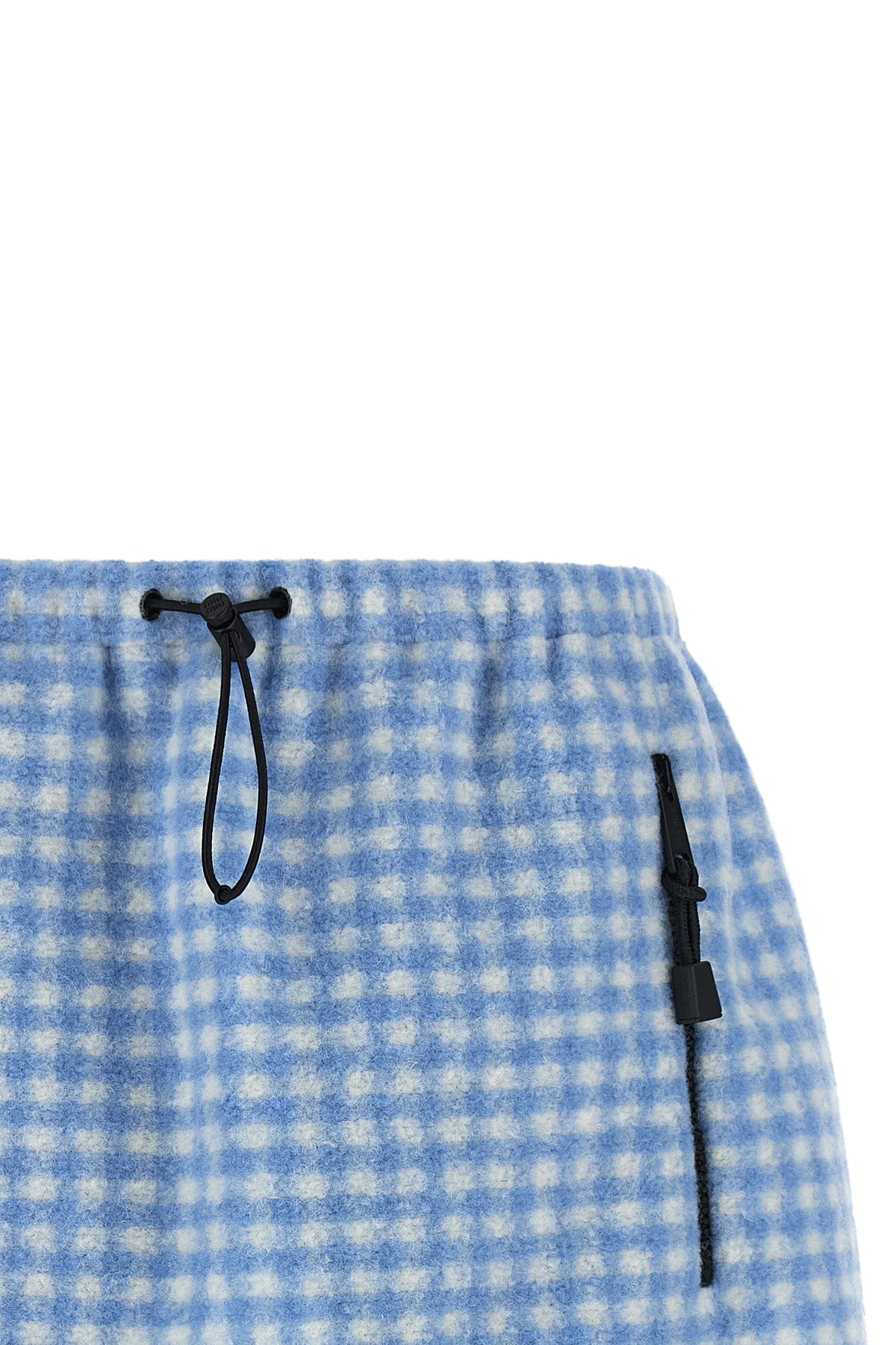 the miu miu miniskirt redefines casual volumes through a short and structured si