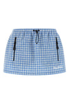 the miu miu miniskirt redefines casual volumes through a short and structured si