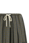 the miu miu mini skirt reinterprets the codes of the collegiate wardrobe through