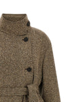 the brunello cucinelli coat redefines the codes of outerwear through an envelopi