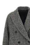 the brunello cucinelli coat redefines the volumes of outerwear through a double-
