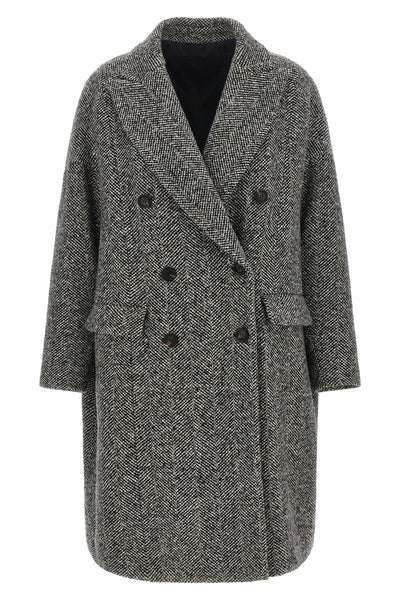 the brunello cucinelli coat redefines the volumes of outerwear through a double-