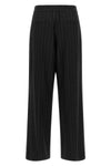 brunello cucinelli trousers redefine sartorial codes through a loose and relaxed