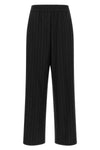 brunello cucinelli trousers redefine sartorial codes through a loose and relaxed