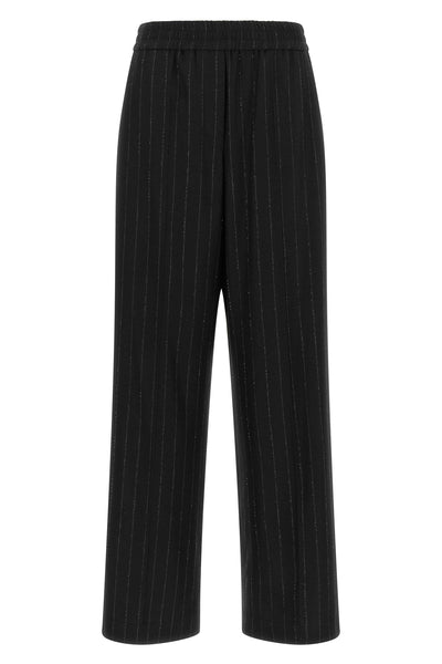 brunello cucinelli trousers redefine sartorial codes through a loose and relaxed