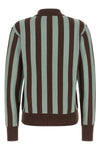 the alberto biani pure cashmere polo shirt stands out for its maxi vertical stri