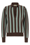 the alberto biani pure cashmere polo shirt stands out for its maxi vertical stri