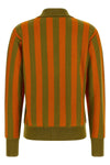 the alberto biani striped cashmere polo shirt redefines luxury knitwear through