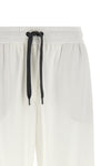 brunello cucinelli track sporty trousers redefine the codes of informal dress
