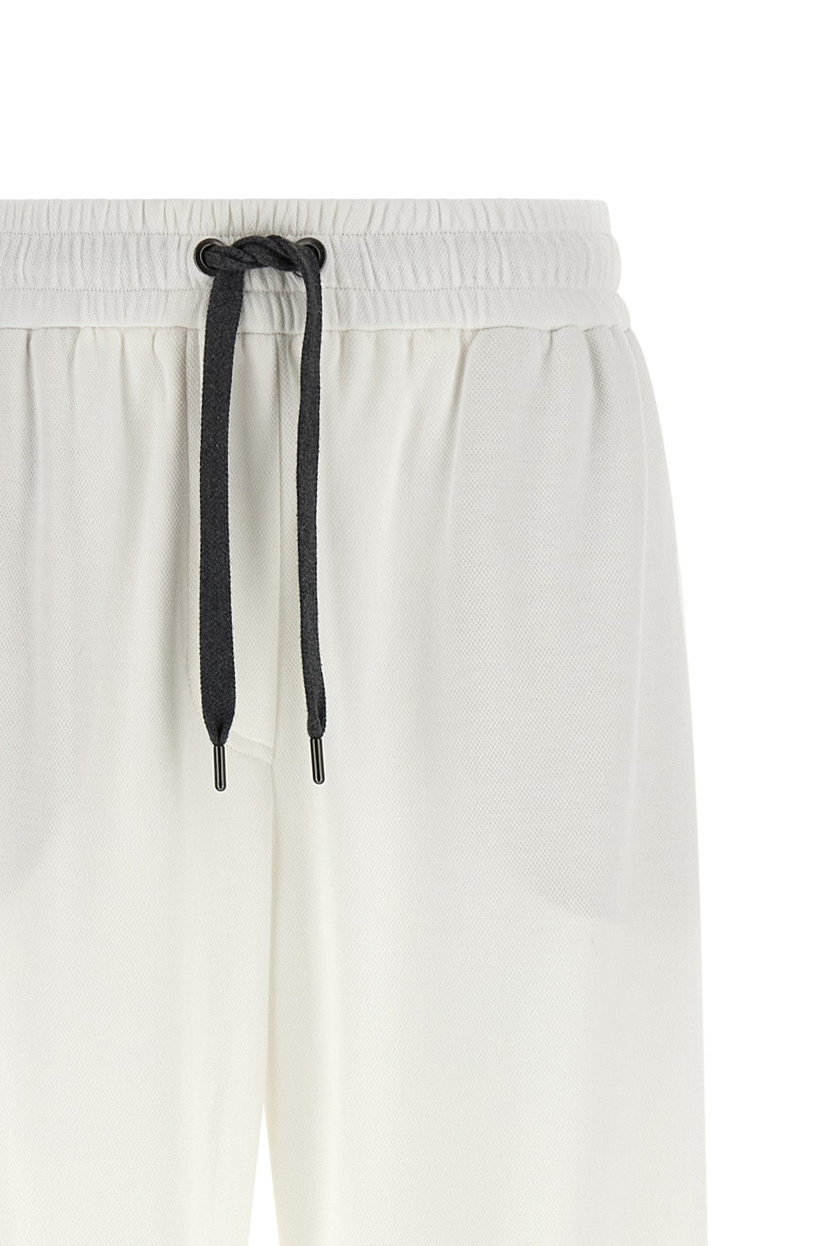 brunello cucinelli track sporty trousers redefine the codes of informal dress