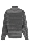 the miu miu striped polo shirt redefines casual luxury through a precise sartori