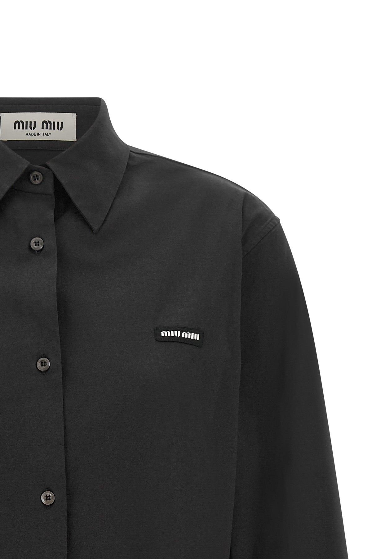 the miu miu stretch cotton poplin shirt reinterprets the codes of the formal war