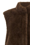 the lou andrea faux fur vest redefines winter layering through a sophisticated m