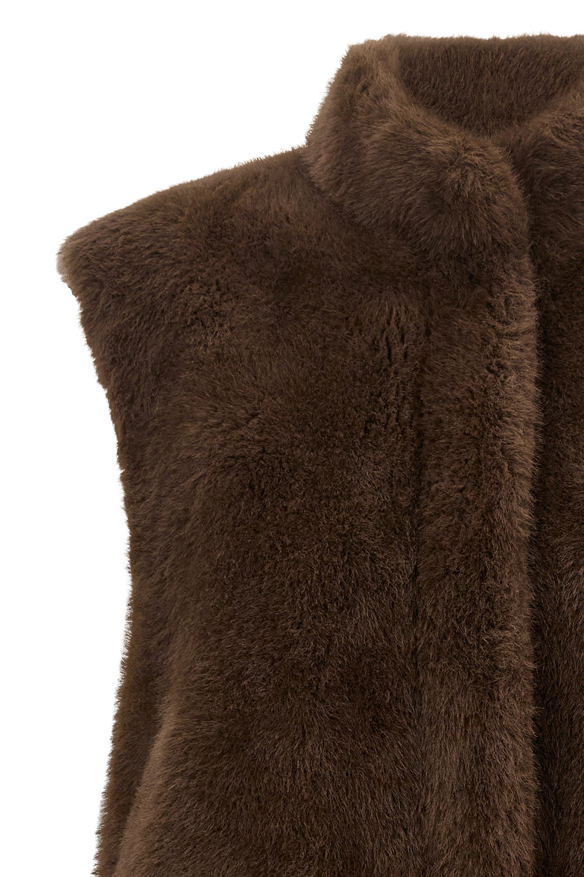 the lou andrea faux fur vest redefines winter layering through a sophisticated m