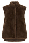 the lou andrea faux fur vest redefines winter layering through a sophisticated m