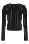 the elisabetta franchi cardigan stands out for a sartorial construction defined