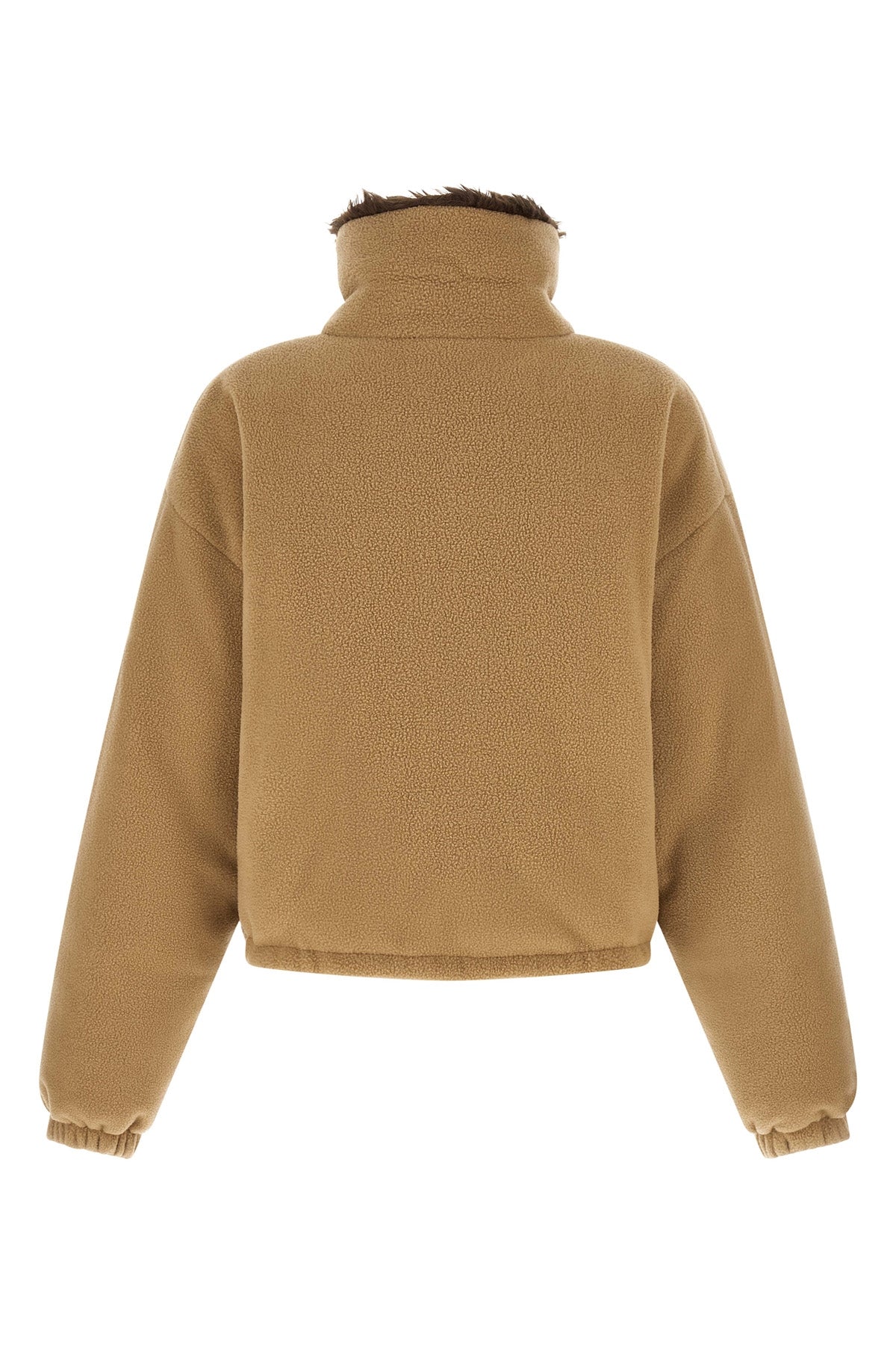miu miu short down jacket redefines volumes through a compact and structured sil