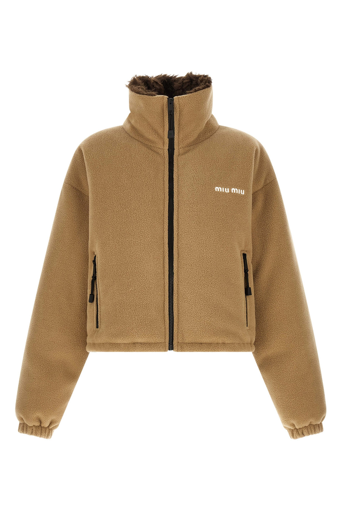 MIU MIU 38 miu miu short down jacket redefines volumes through a compact and structured sil