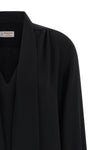 the alberto biani blouse in fluid cady stands out for its relaxed silhouette and