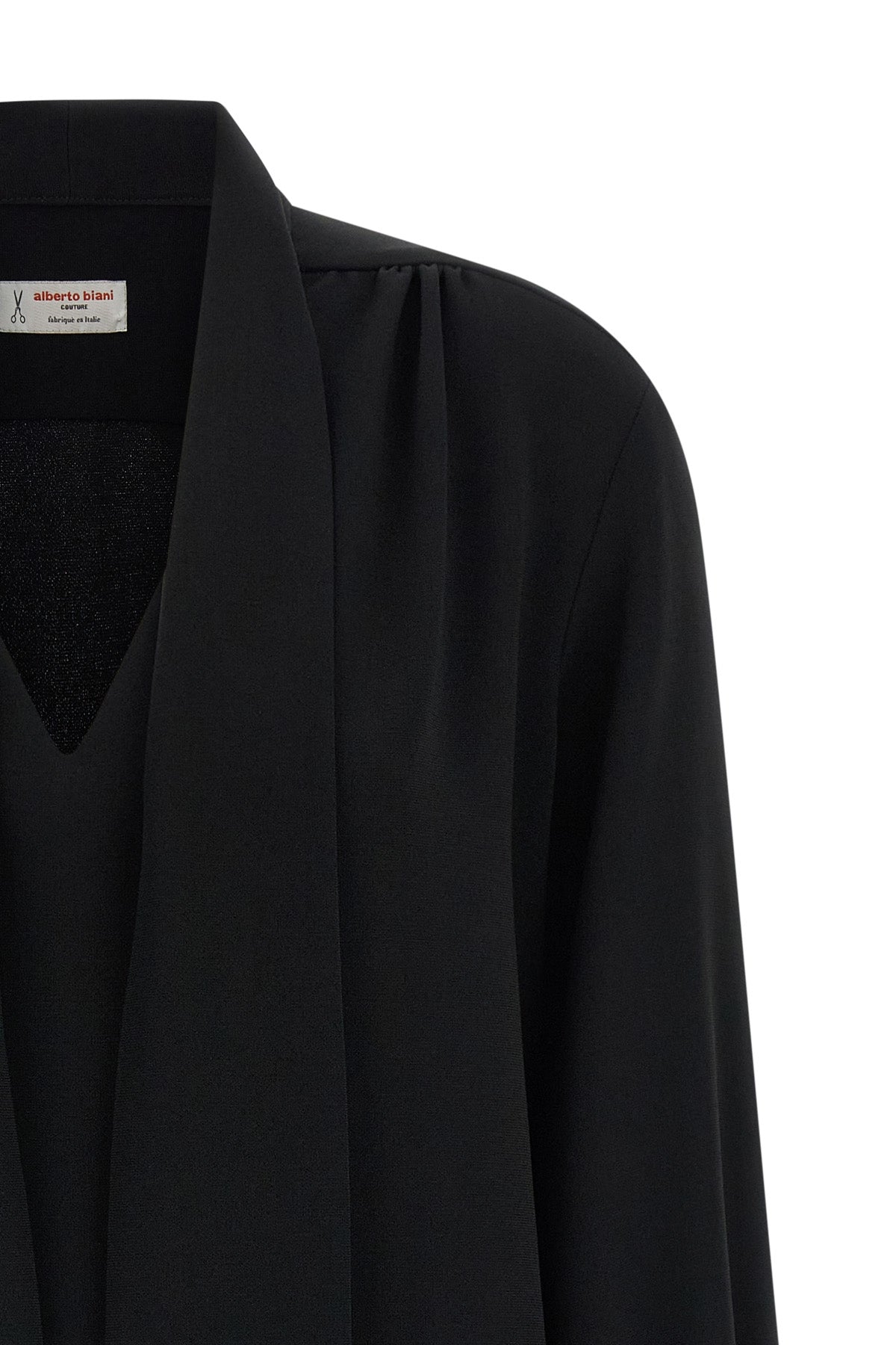 the alberto biani blouse in fluid cady stands out for its relaxed silhouette and