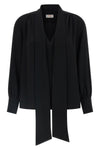 the alberto biani blouse in fluid cady stands out for its relaxed silhouette and