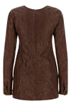 the miu miu dress defines a new sartorial aesthetic through a rigorous material