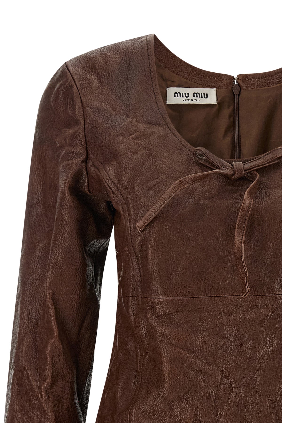 the miu miu dress defines a new sartorial aesthetic through a rigorous material