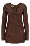 the miu miu dress defines a new sartorial aesthetic through a rigorous material