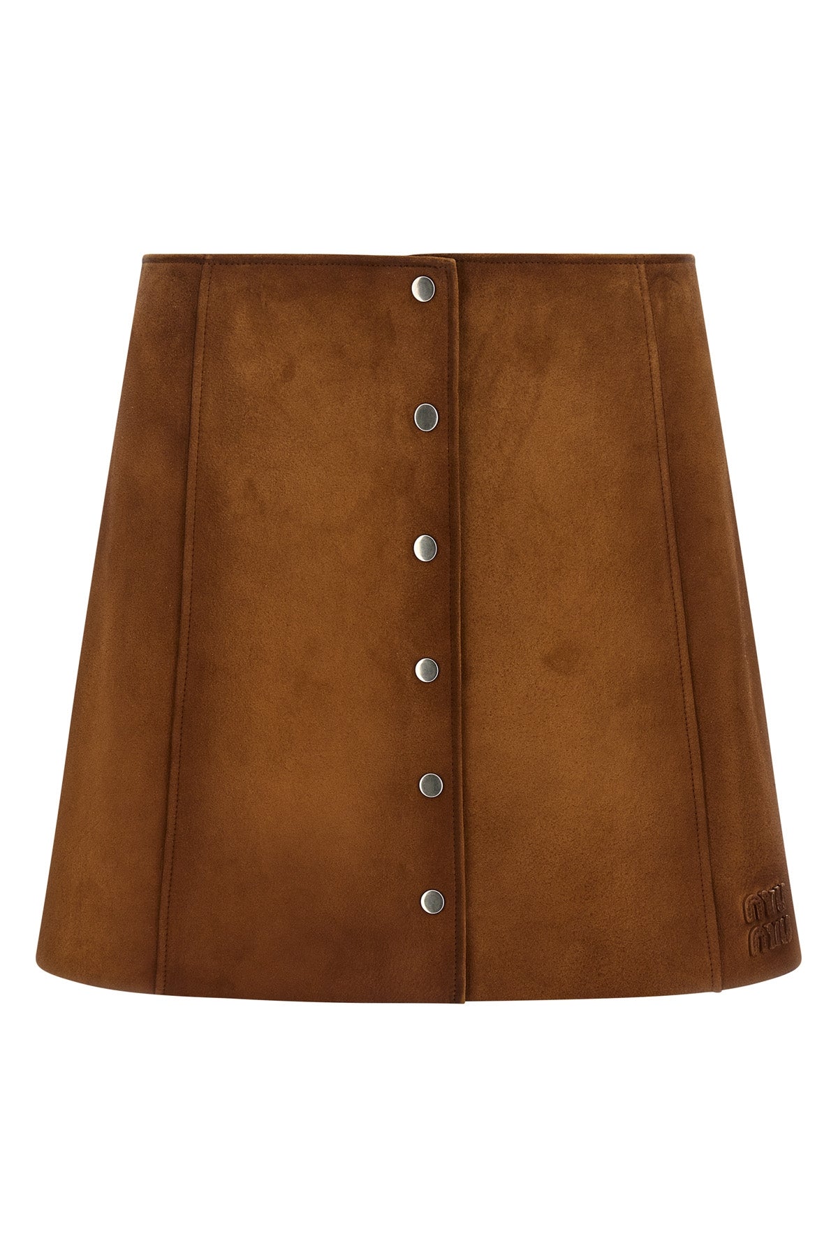 suede mini skirt undergoing final waxing treatment