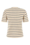 the maison kitsuné t-shirt redefines the everyday wardrobe through a tight silho
