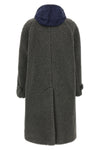 the miu miu wool blend coat has an oversize and enveloping silhouette