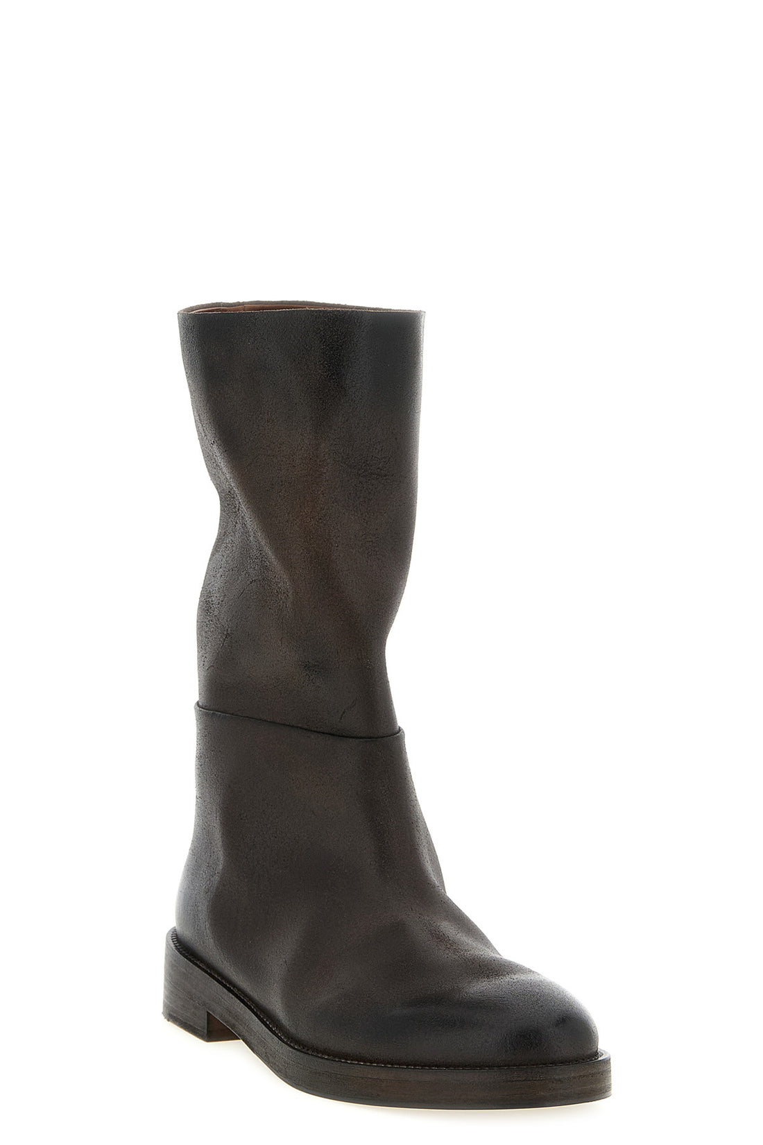 MARSÈLL 36 the tubetto marsèll boots define a deconstructed aesthetic through a fluid sil