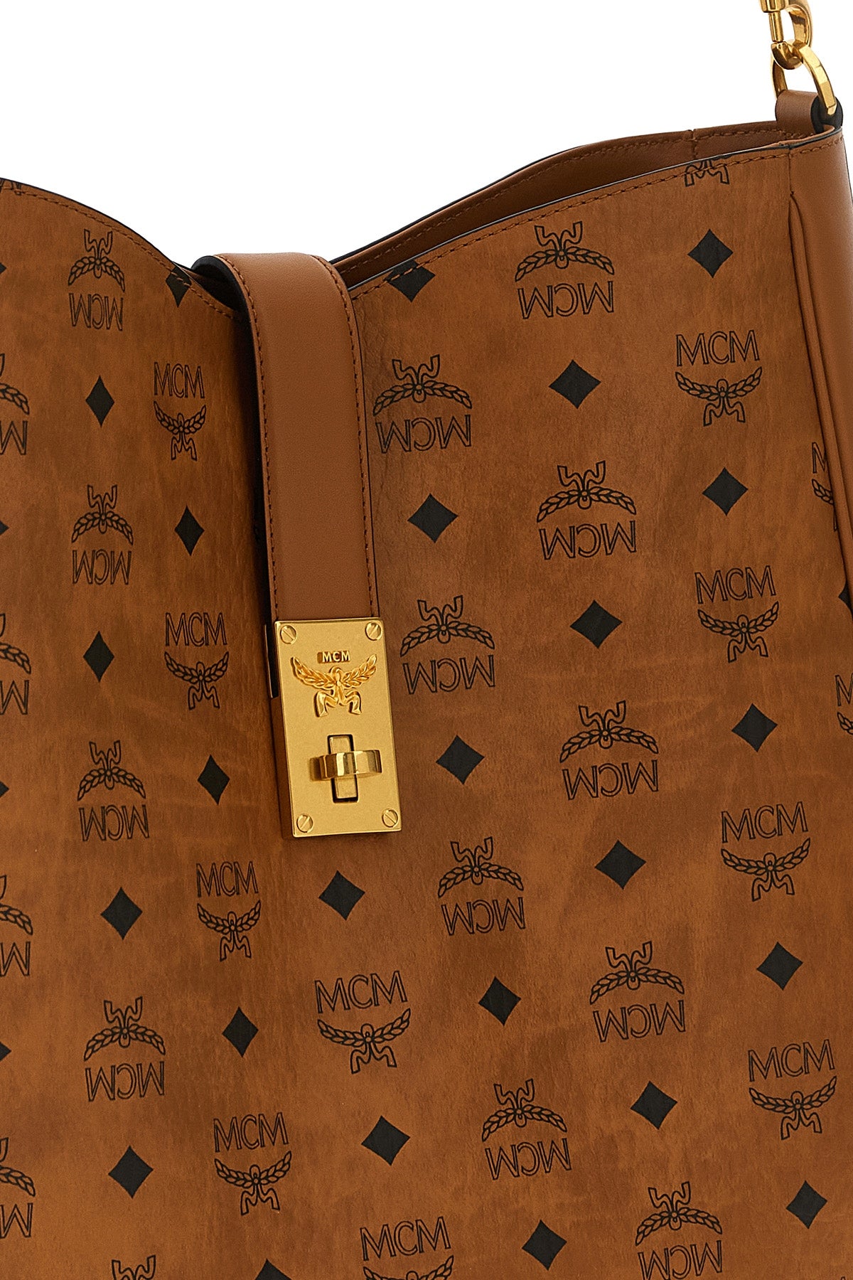 the large mcm tracy shoulder bag defines a structured aesthetic through the ic