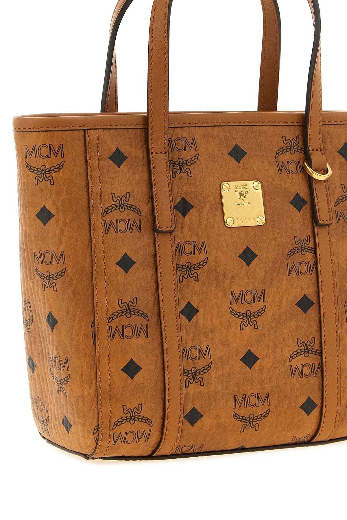 mcms toni small shopper bag features a structured silhouette defined by the m
