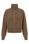 the n°385 xtra cute cardigan by extreme cashmere redefines knitwear through a